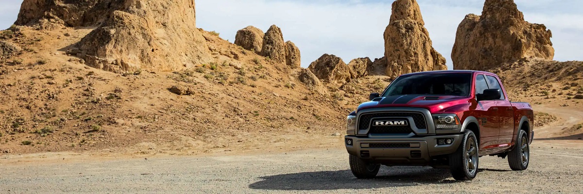 A maroon 2021 Ram 1500 classic in the desert.