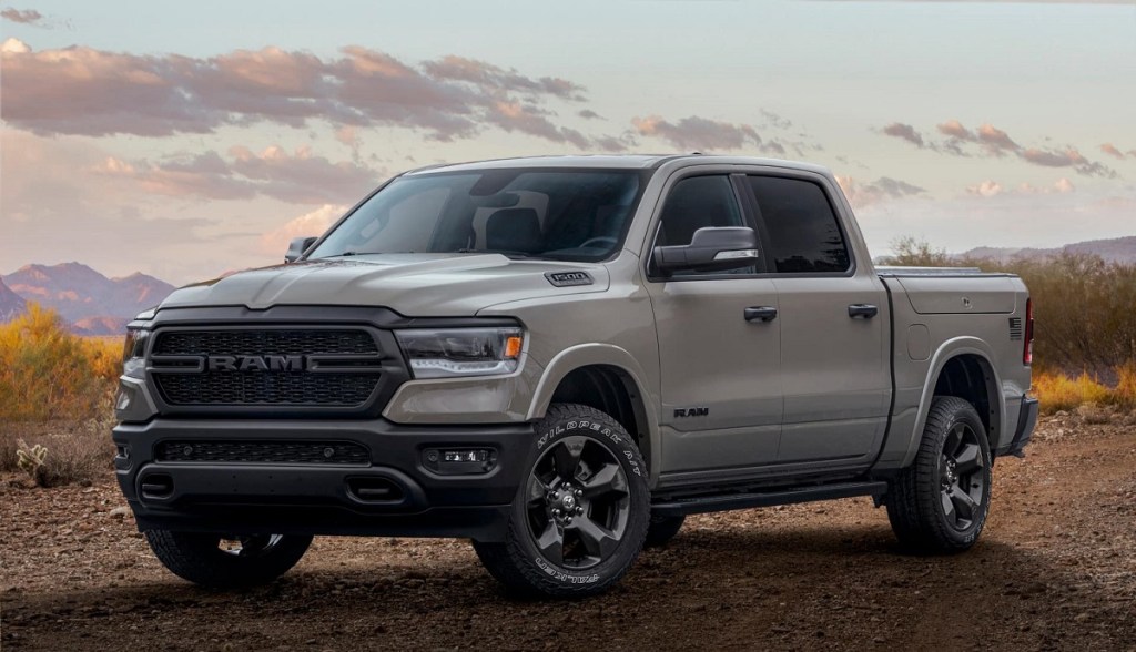 A 2021 Dodge Ram 1500 in a field.