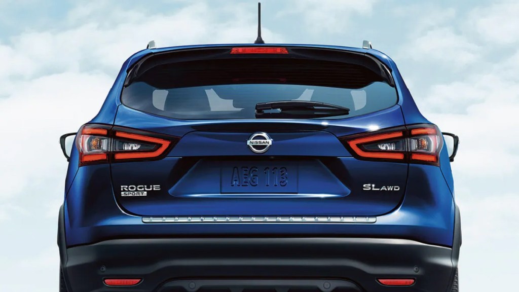 The rear of a blue 2021 Nissan Rogue Sport.