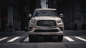 The 2021 Infiniti QX80 driving up the street