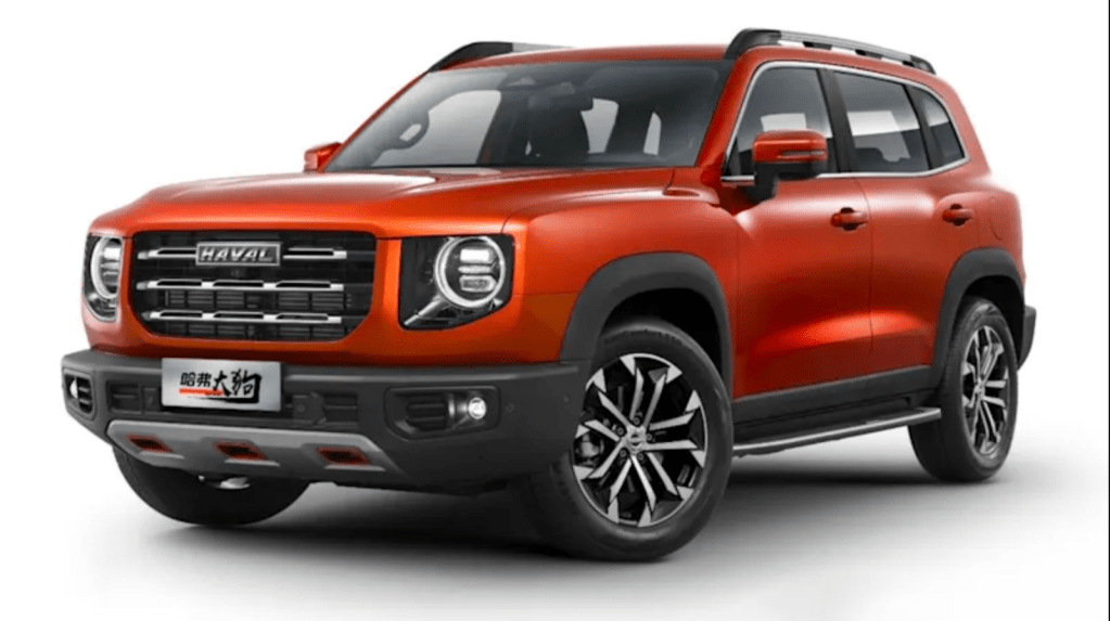 An orange Haval Big Dog SUV on with a white background