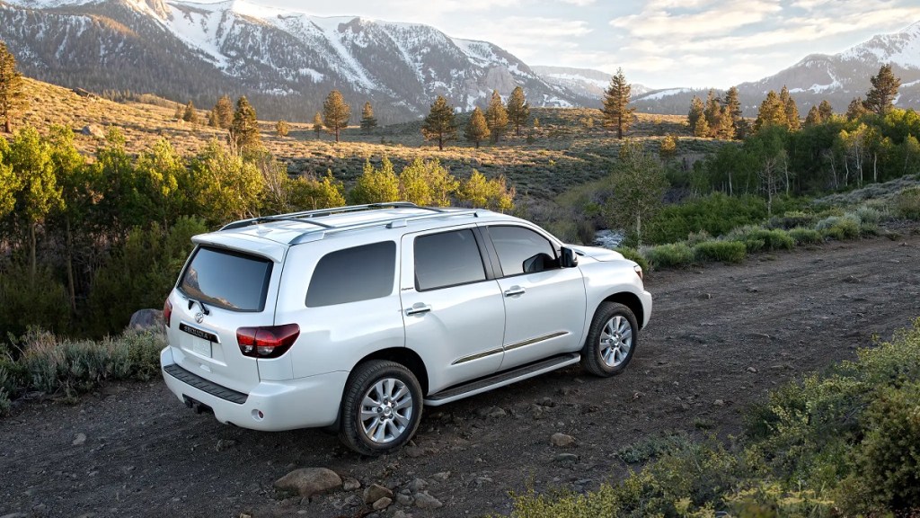 A white 2021 Toyota Sequoia drives up a mountain. 