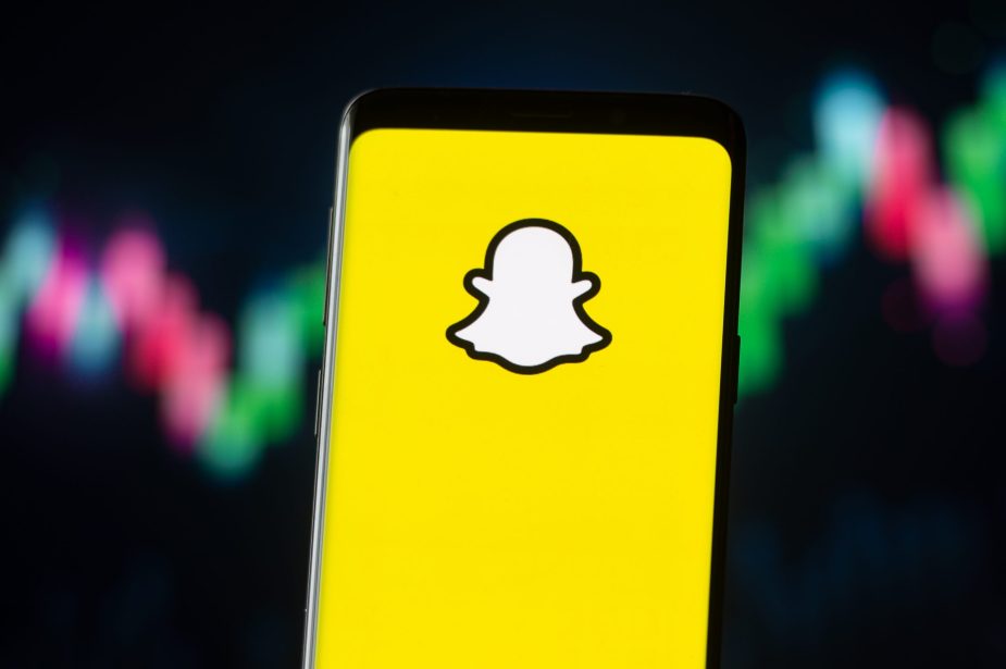 In this photo illustration a Snapchat logo seen displayed on a smartphone