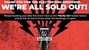 A red and black "Sold Out" sign on the Revolt Motors website.