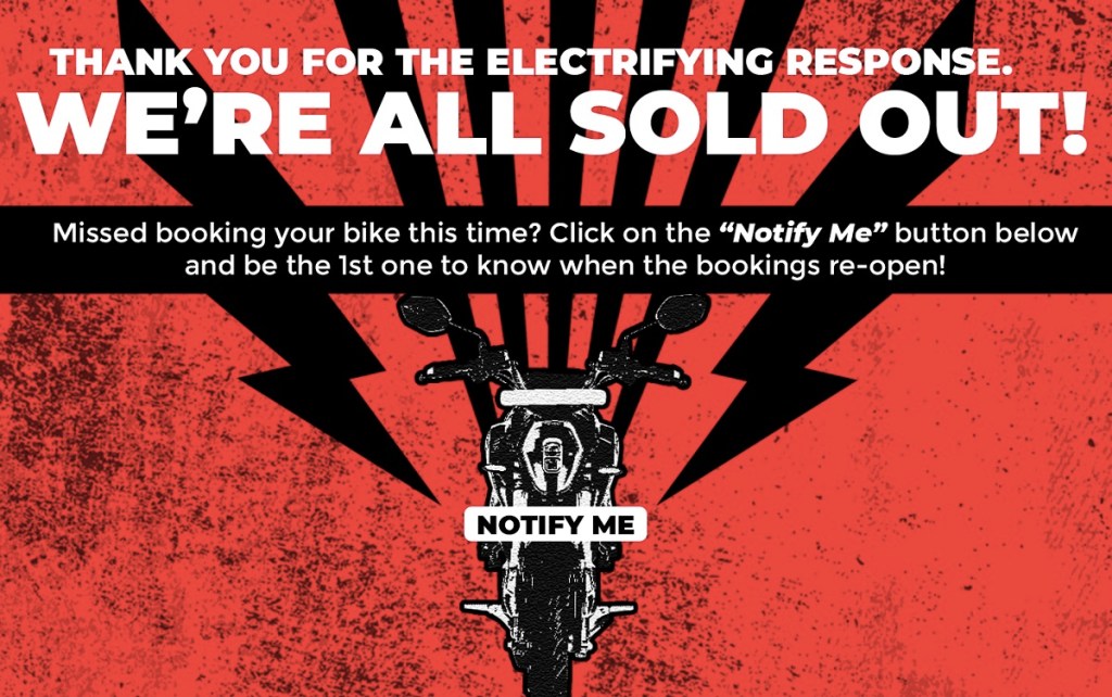 A red and black "Sold Out" sign on the Revolt Motors website.