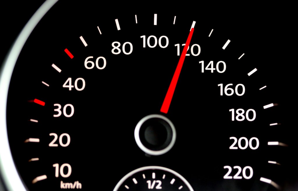 A speedometer showing 120 mph