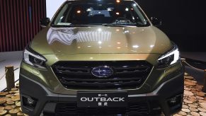 The greenish Subaru Motor Outback car is on displayed during the 19th Shanghai International Automobile Industry Exhibition