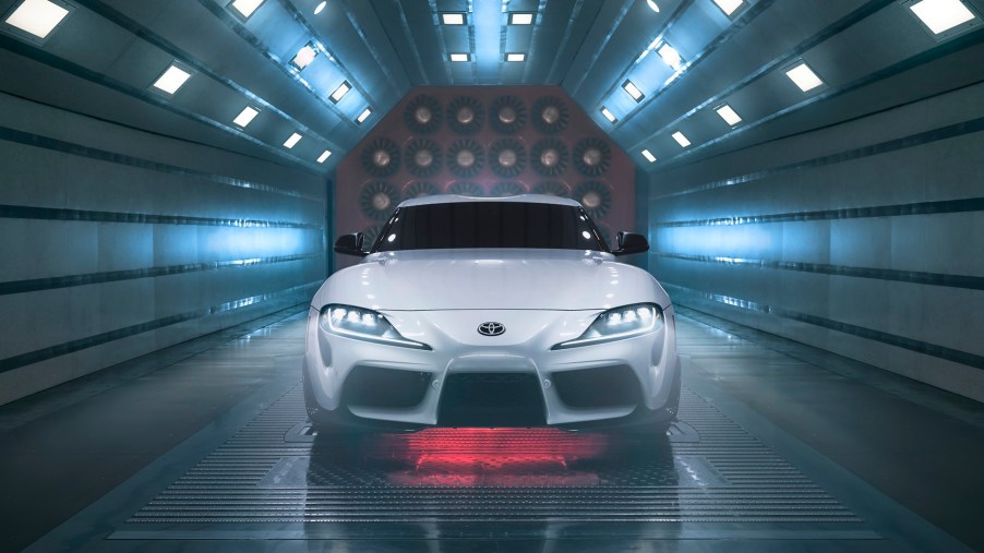 A white A91 Supra CF front facing in a wind tunnel