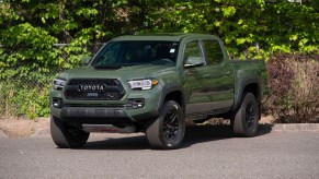 A green 2020 Toyota Tacoma TRD Pro, in a parking lot