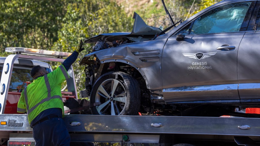 The Genesis GV80 SUV that Tiger Woods crashed on February 23, 2021, in Rolling Hills Estates, California, is seen on a flat-bed tow truck