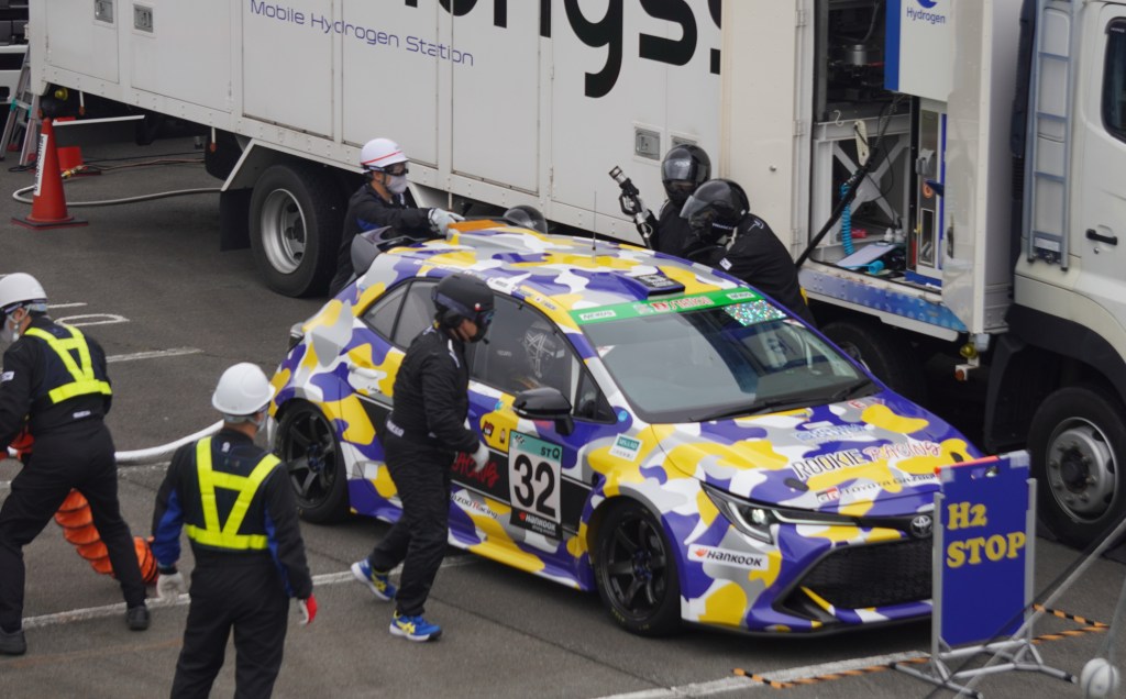 Toyota Corolla hydrogen-powered race car in the pits