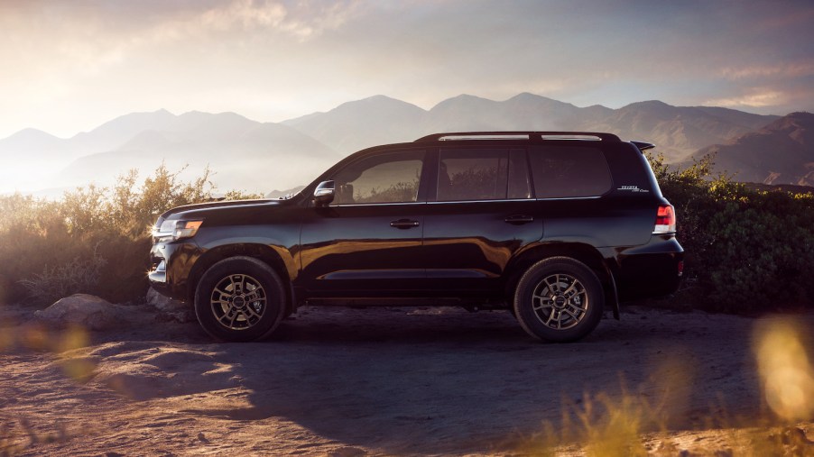 A black Toyota Land Cruiser Heritage Edition parked in the mountains, Toyota is one of the longest-lasting car brands