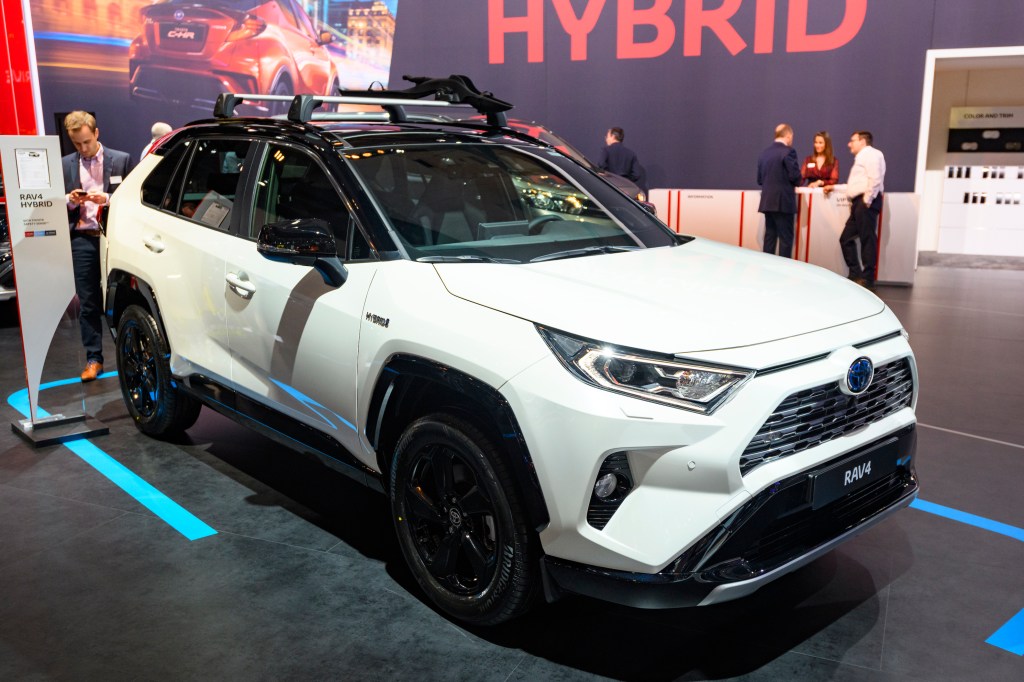 White Toyota RAV4 Hybrid compact SUV on display at Brussels Expo