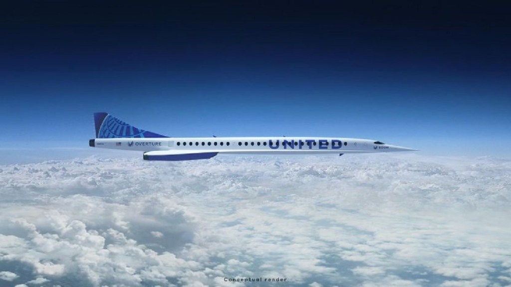 A white plane with a blue "United" printed on the side, flying high above the clouds. 