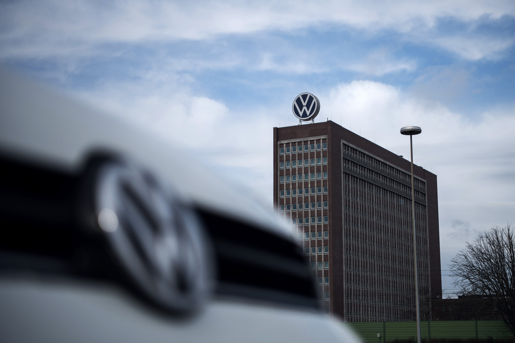 A VW logo on top of offices at the Volkswagen AG headquarters in Wolfsburg, Germany, in February 2021