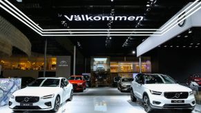 Cars are seen at the Volvo booth at the Shanghai Auto Show