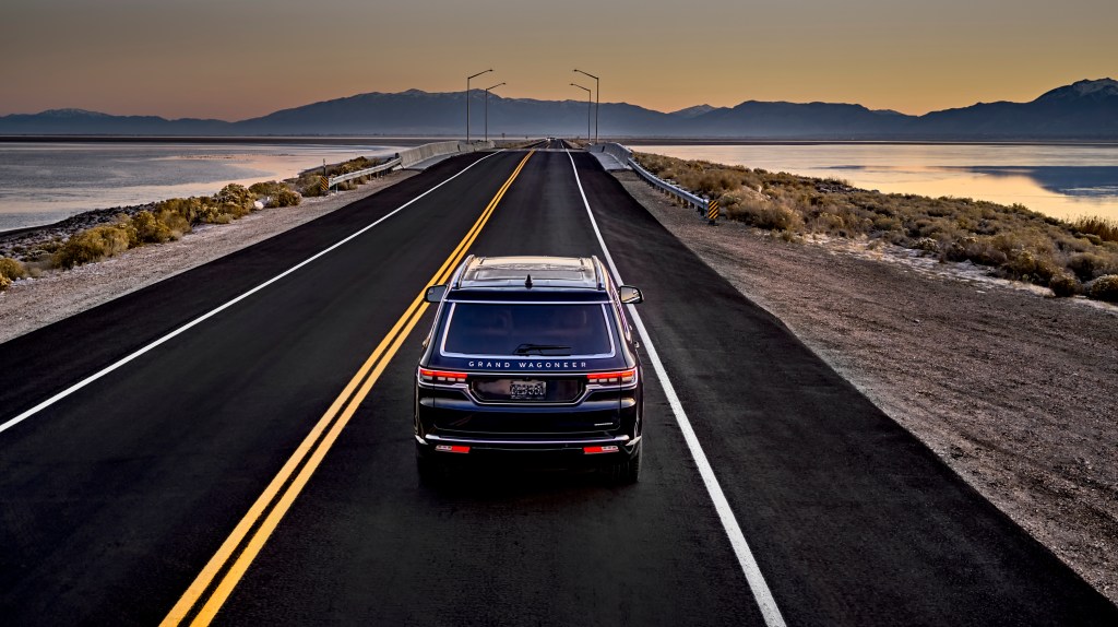 The 2022 Jeep Grand Wagoneer drives off into the sunset