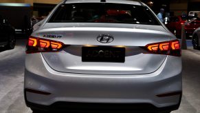The rear end of a silver 2021 hyundai accent
