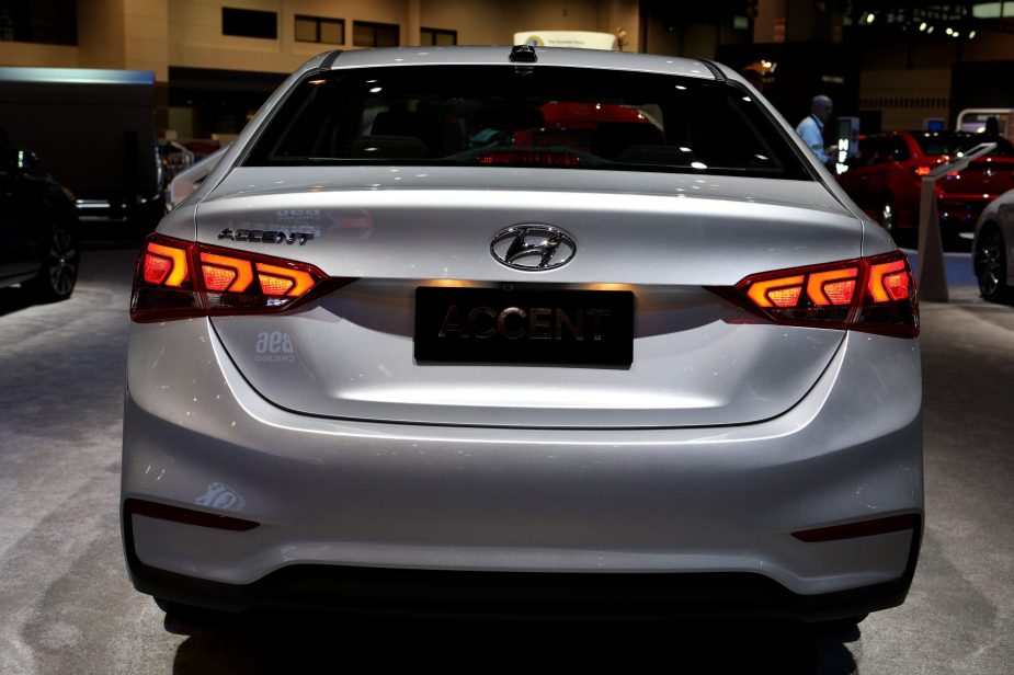 The rear end of a silver 2021 hyundai accent