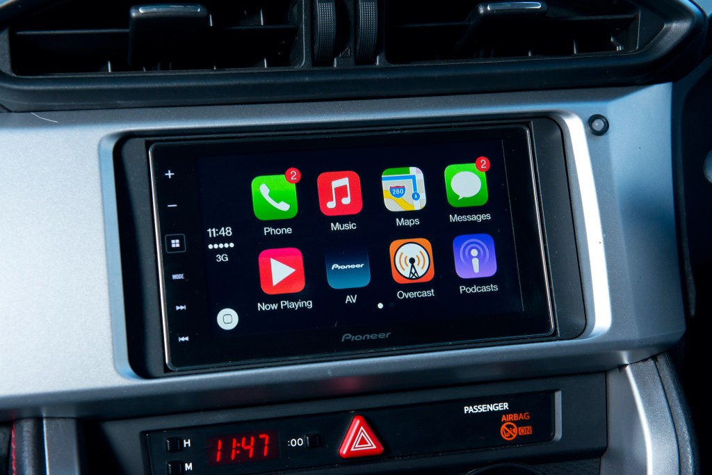 Detail of a Pioneer head unit fitted in a Subaru BRZ, photographed for a feature on Apple's CarPlay.