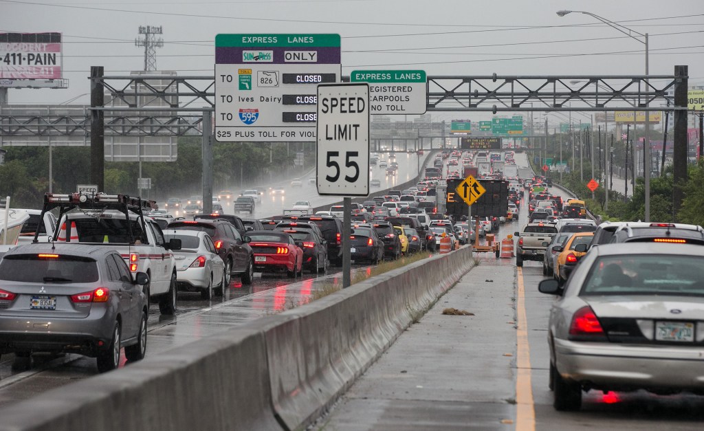 Vehicles with hazard lights on in bumper-to-bumper traffic on Interstate 95 northbound in Miami in September 2018