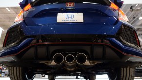 The triple exhaust pipes of the Honda Civic Type R