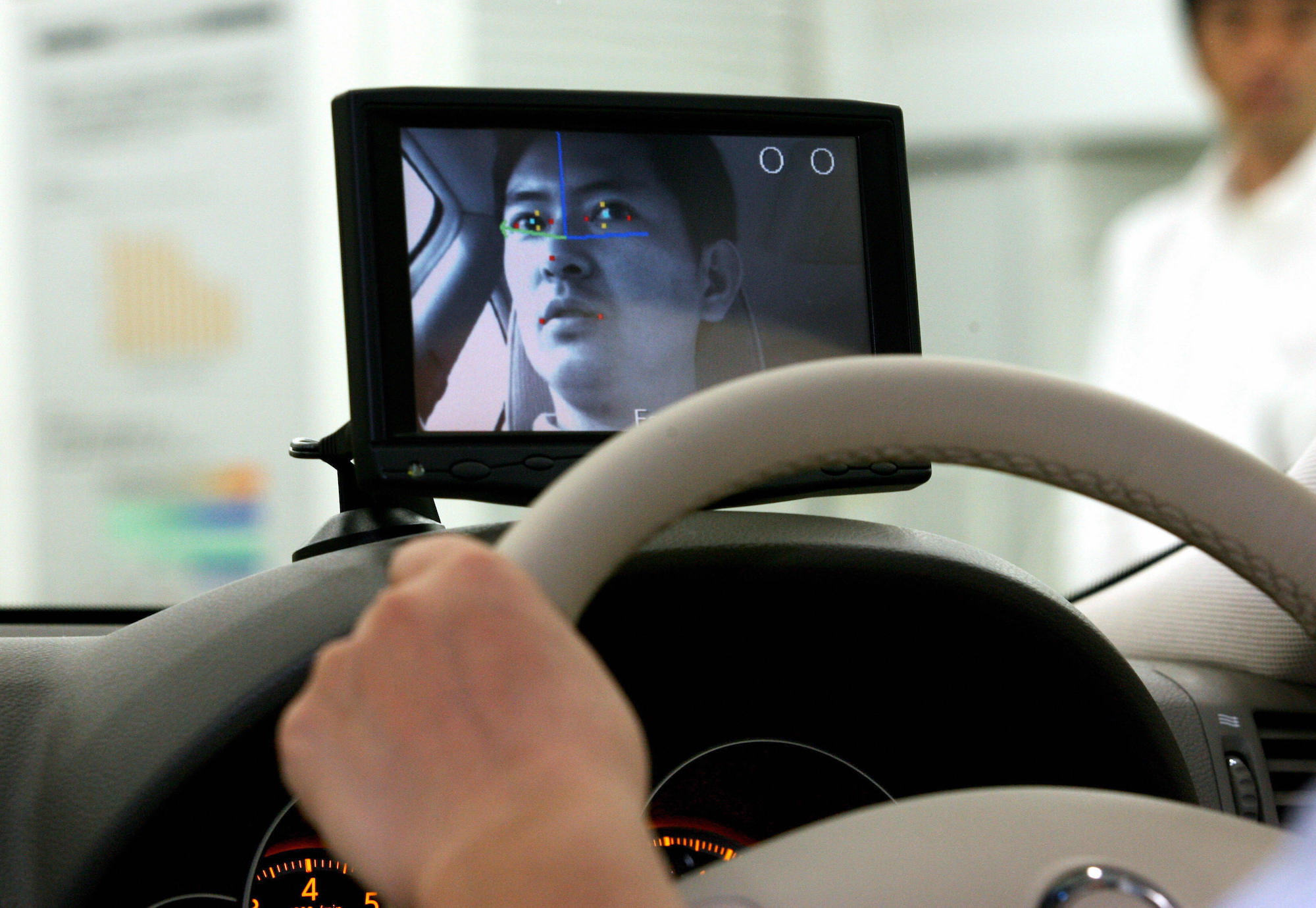 Nissan illustrates its facial recognition system, monitoring a driver's face to detect signs of drowsiness