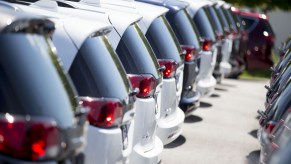 A row of 2017 Crysler Pacifica minivans displayed for sale at a car dealership in Moline, Illinois, in July 2017