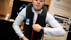 Pierre-François Tissot wears an In&motion smart motorcycle airbag vest during a press event for CES 2017 in Las Vegas, Nevada
