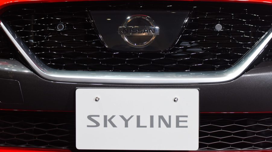 The grille of a red Nissan Skyline