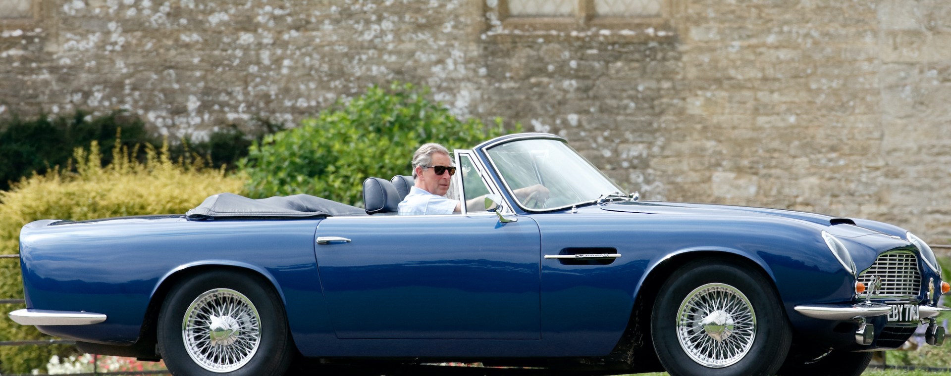 Prince Charles in a convertible