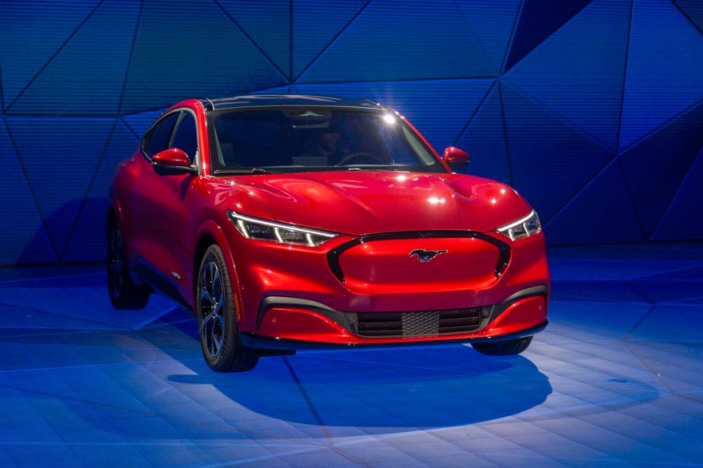 A red 2021 Ford Mustang Mach-E on display 