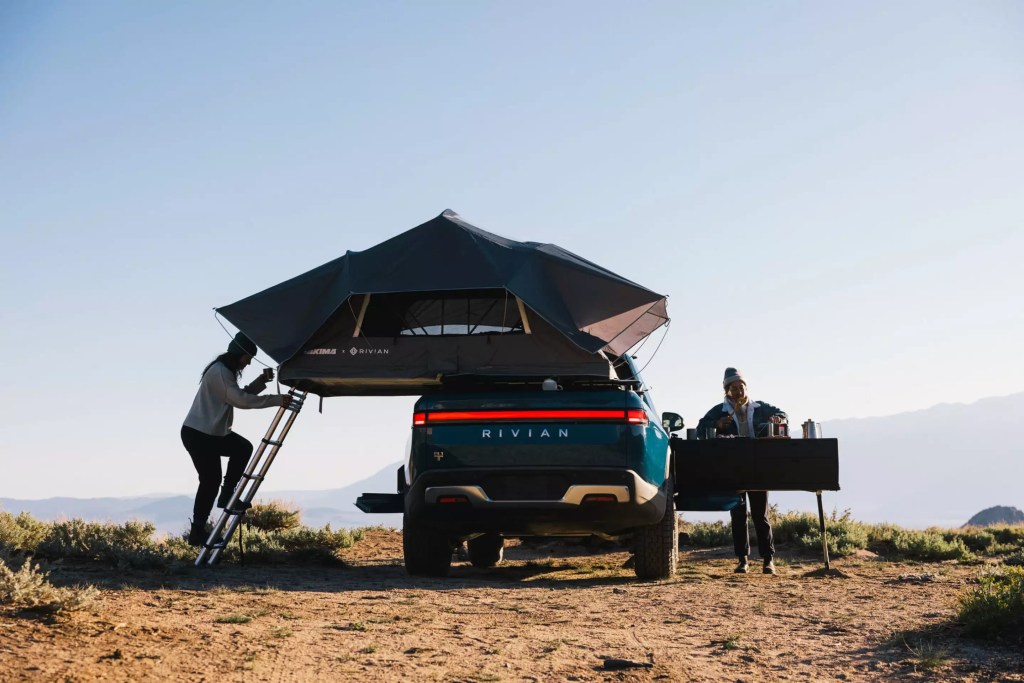Rivian R1T is the coolest electric truck with its camper van mode featuring the Adventure Gear line.  