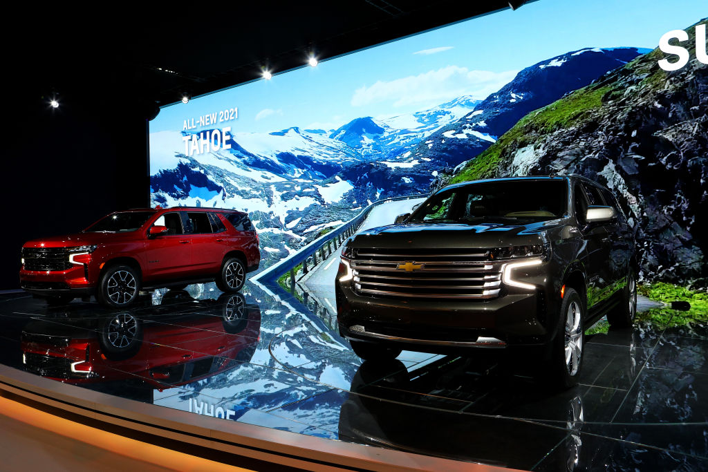 A 2021 Chevrolet Tahoe and 2021 Chevrolet Suburban on display