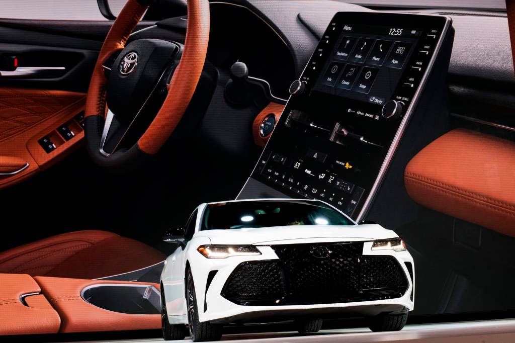 A new toyota avalon with a sneak peak of the interior