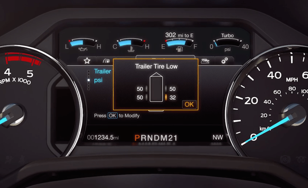 The display on a Ford pickup truck showing low tire pressure on the trailer
