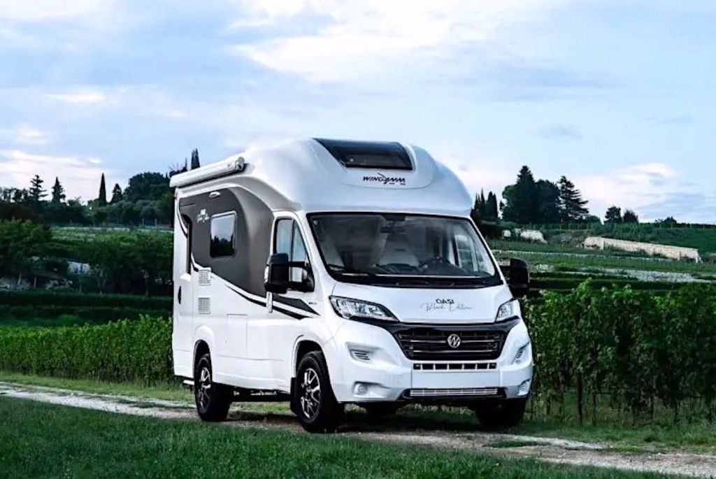 The Wingamm Oasi 540 is a tiny camper parked on a dirt road