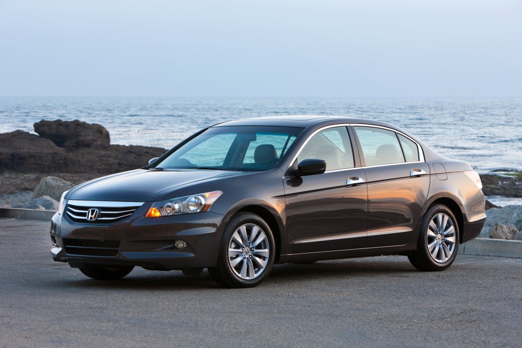 a 2011 Honda Accord parked near the shore in a press photo 