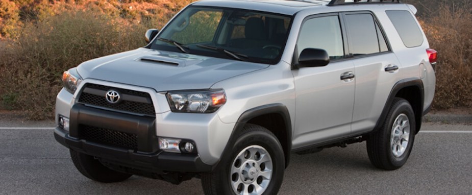 a silver 2013 Toyota 4Runner Trail model