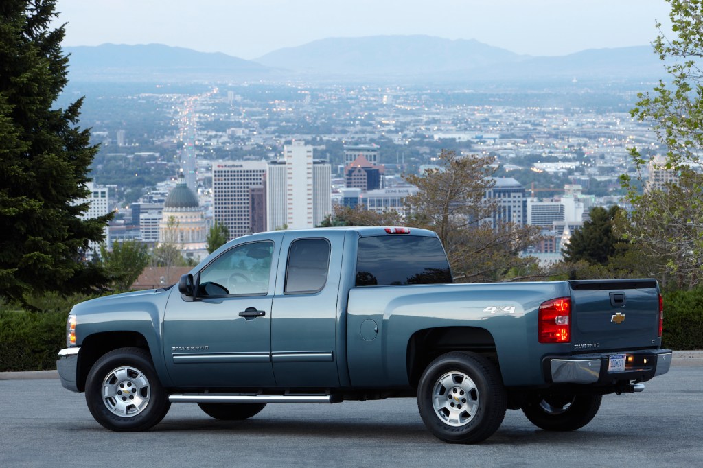 A 2013 Chevrolet Silverado LT Extended Cab Pickup parked, the 2013 Chevy Silverado is a used full-size truck