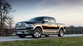 A 2013 Ram 1500 parked near a patch of grass, the 2013 Ram 1500 is one of the best used full-size trucks under $20,000