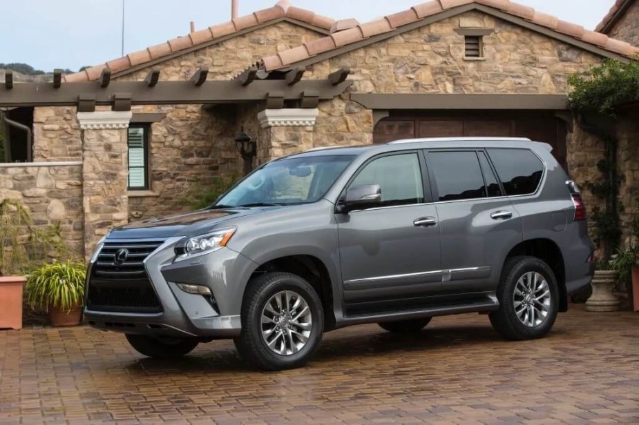 The 2017 Lexus GX 460 parked in front of a home exemplifies one of the best used lexus SUVs according to data