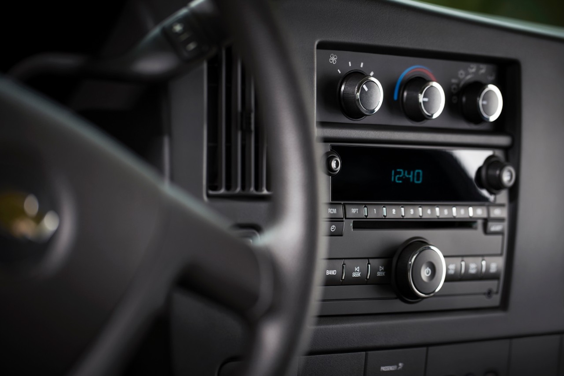 An image of a CD Player in a Chevrolet Express van, one of few models GM is killing the option for.