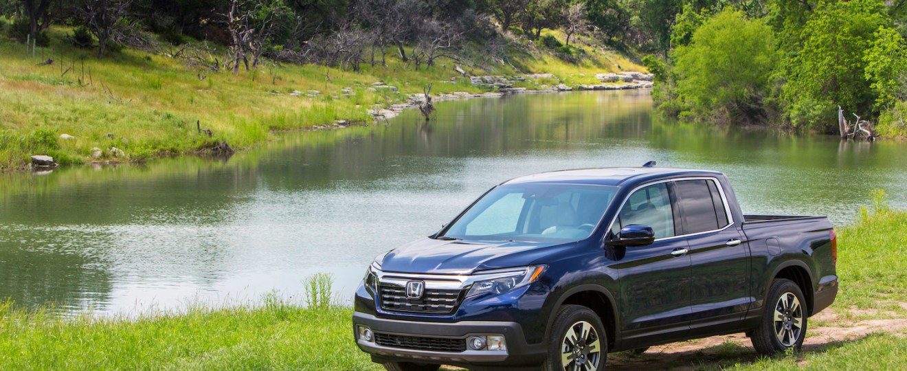 A 2018 Honda Ridgeline parked in the wilderness, the 2018 is a used Honda Ridgeline year to avoid