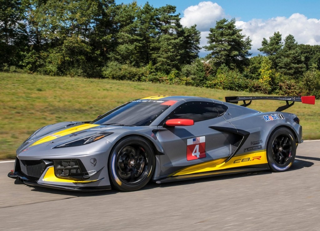 The gray-yellow-and-red 2020 Chevrolet Corvette C8.R driving around a track