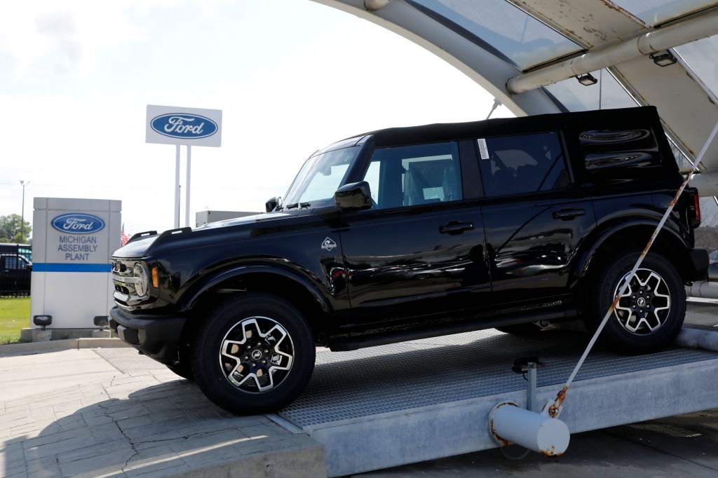 A black 2021 Ford Bronco SUV on display outdoors
