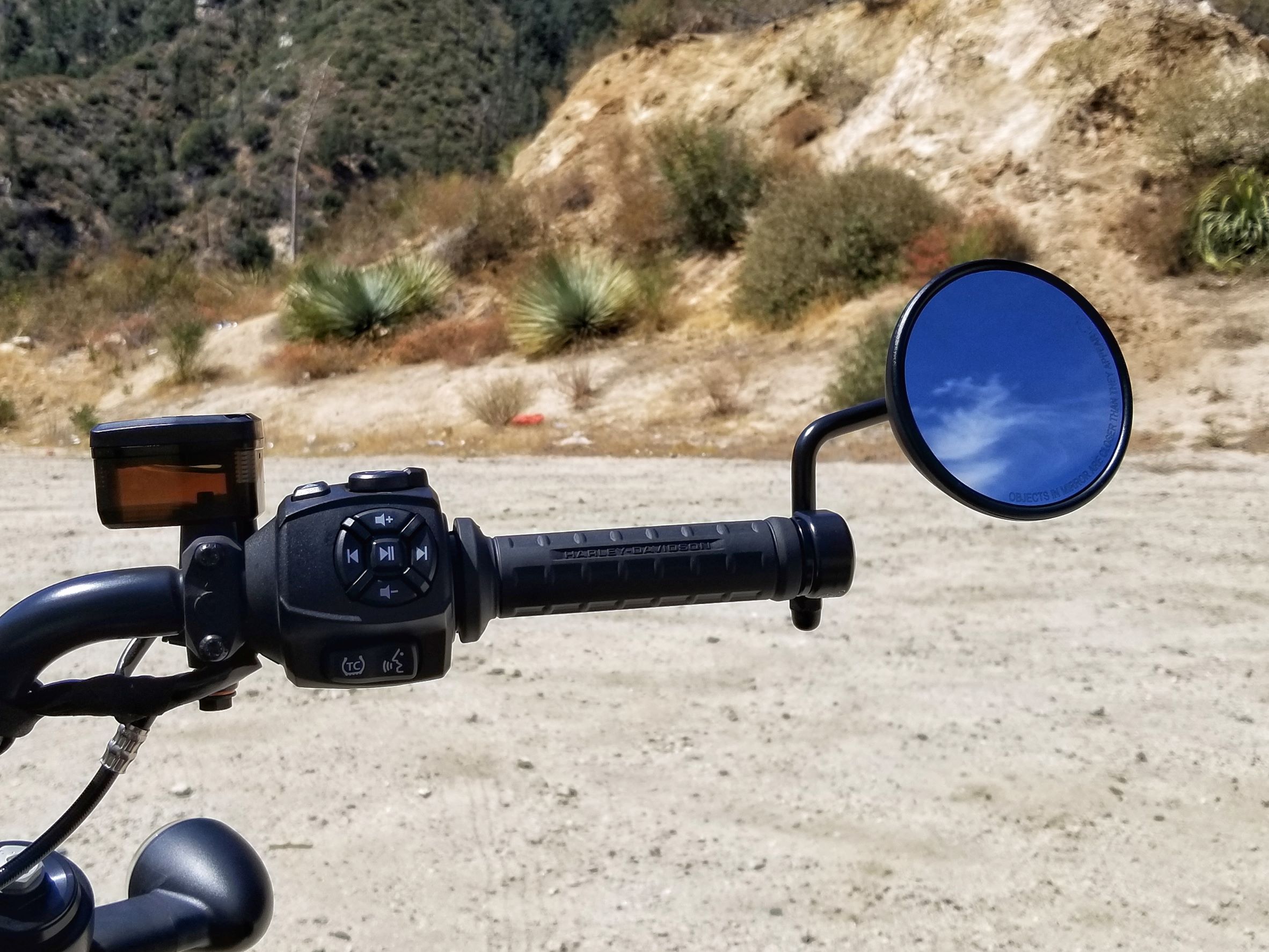 A closeup view of a 2021 Harley-Davidson Sportster S's right handlebar