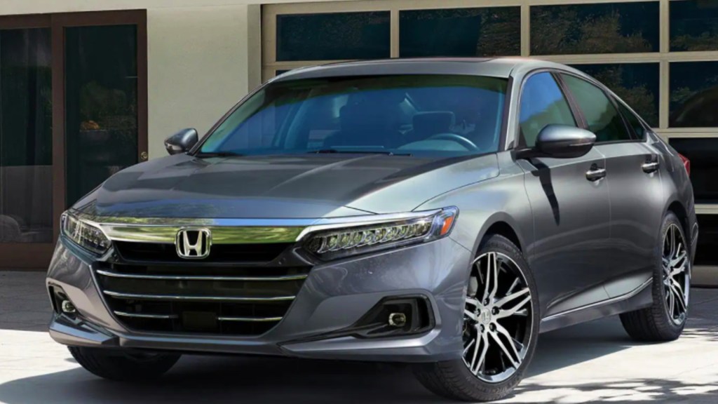 2021 Honda Accord hybrid parked outside of a home 