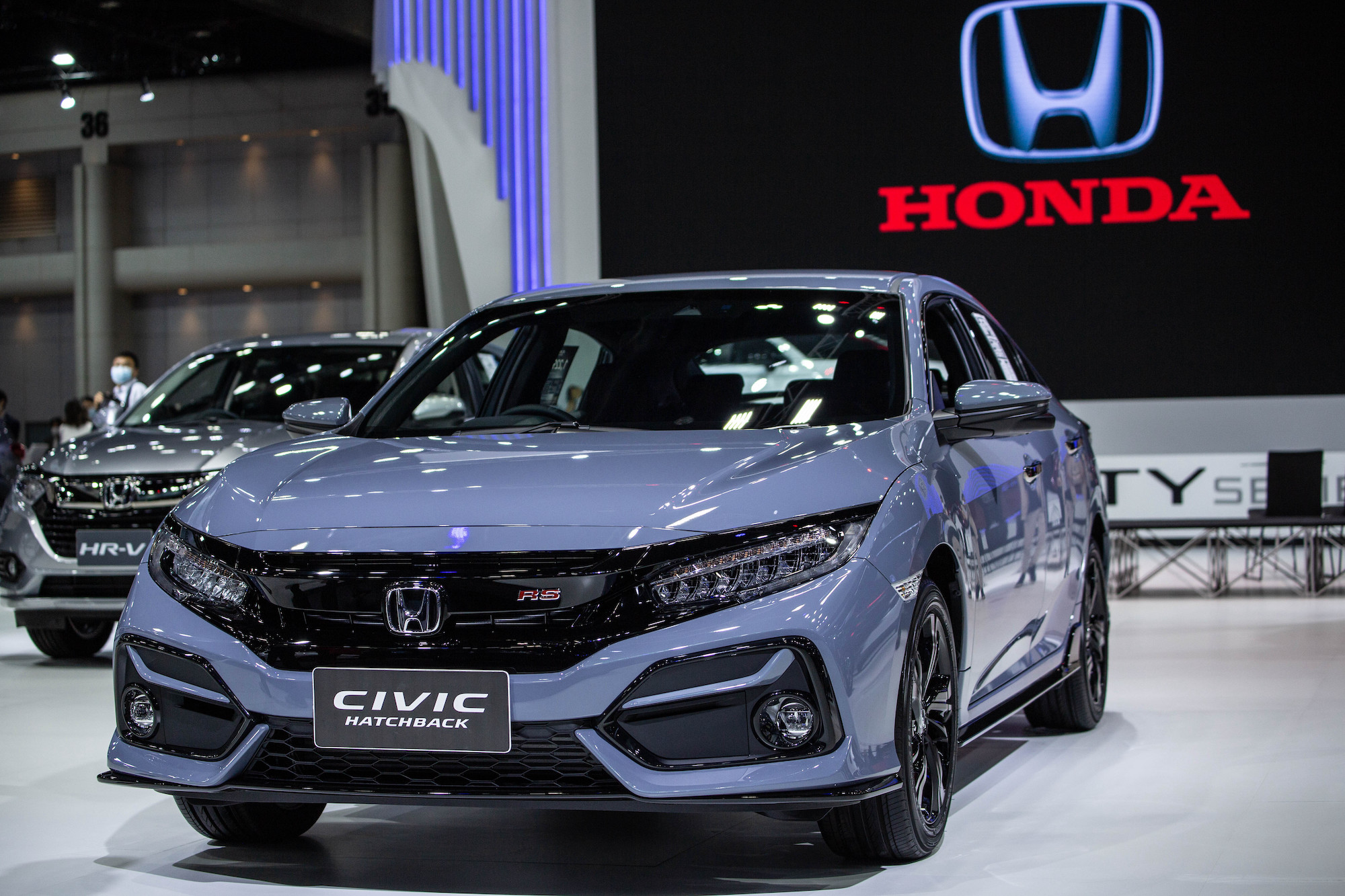 A grayish-blue 2021 Honda Civic Hatchback at the Bangkok International Motor Show in March 2021