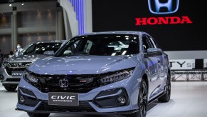 A grayish-blue 2021 Honda Civic Hatchback at the Bangkok International Motor Show in March 2021
